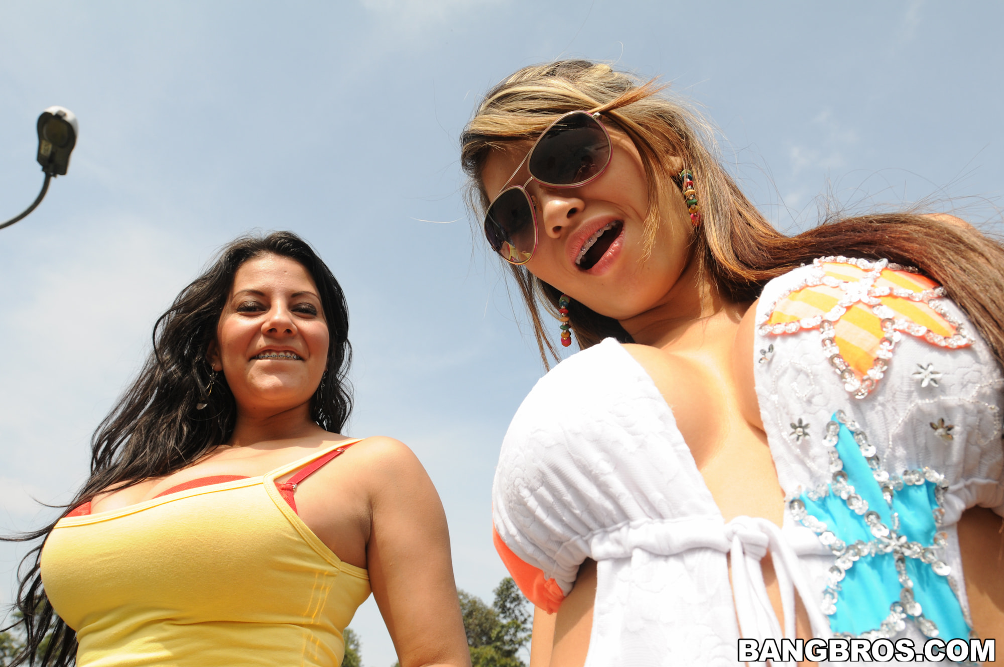 Two pretty Latinas with big natural tits get fucked